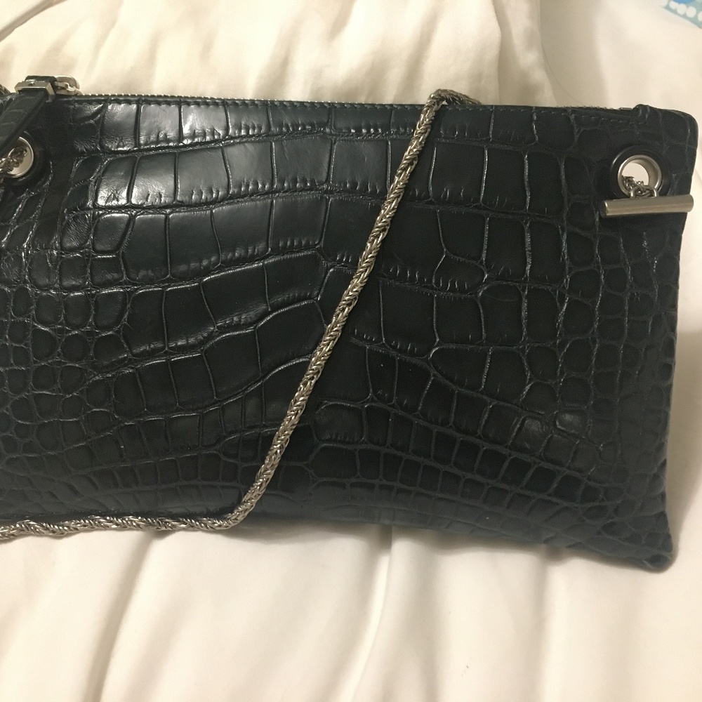 New The Row Alligator clutch 6,250$ -now 895$